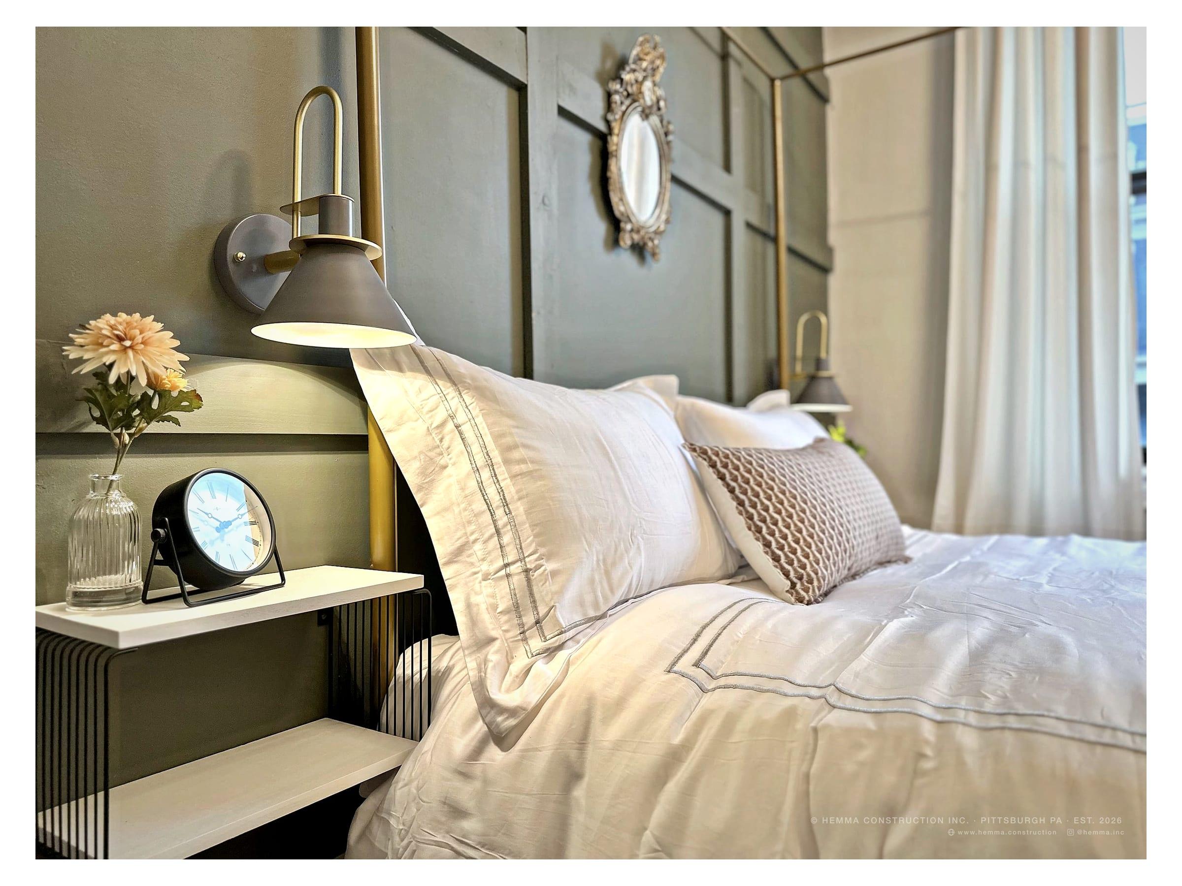 Brass canopy bed with hotel linens — bedroom, Bloomfield unit