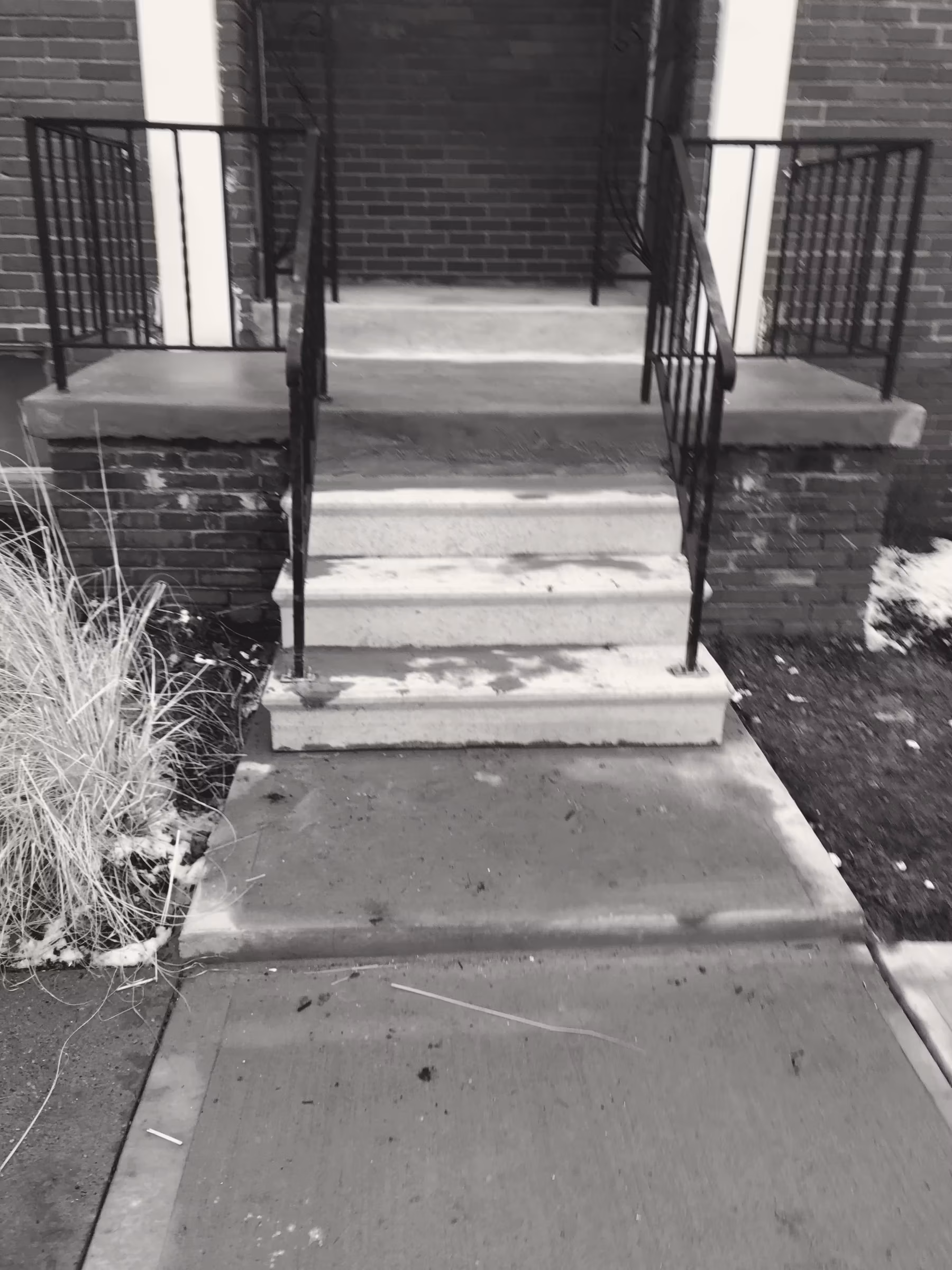 Concrete · stoop restoration · brick row (b)