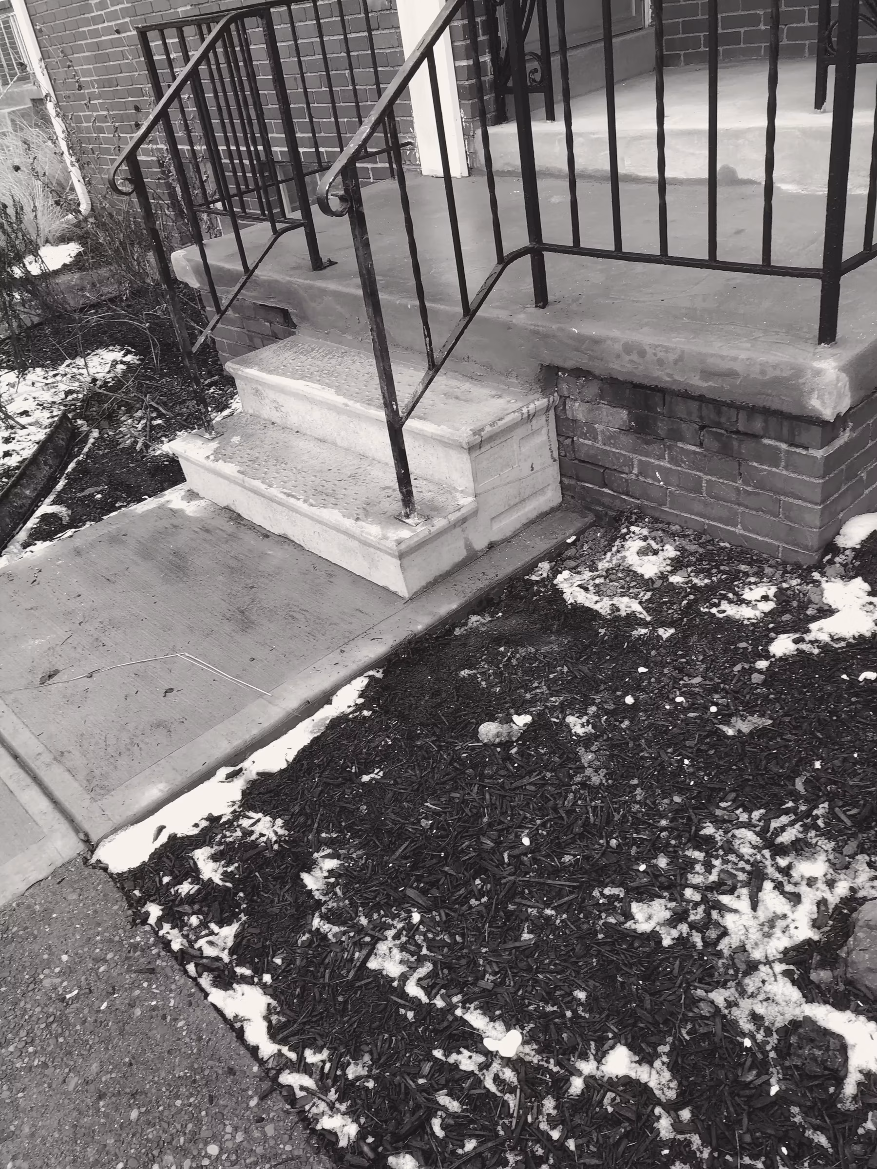 Concrete · stoop restoration · brick row (e)