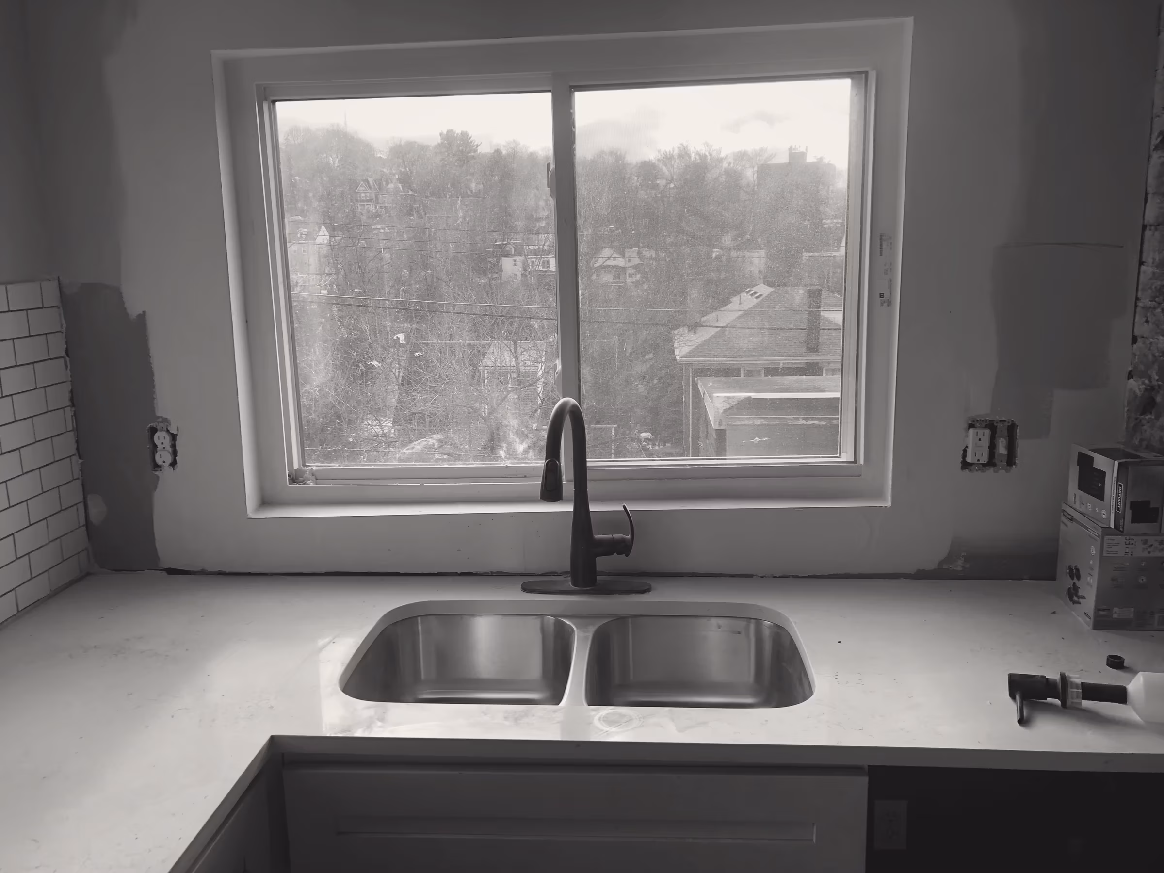 Kitchen · undermount sink · backsplash in progress
